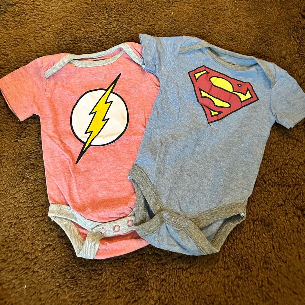 Two Justice league onesies